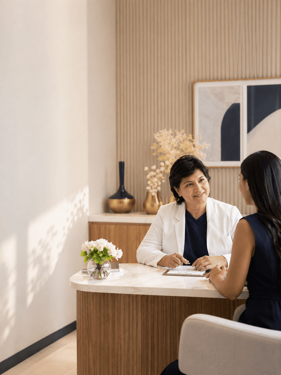 Doctor consulting with a patient at Doc Radi Beauty & Wellness Clinic